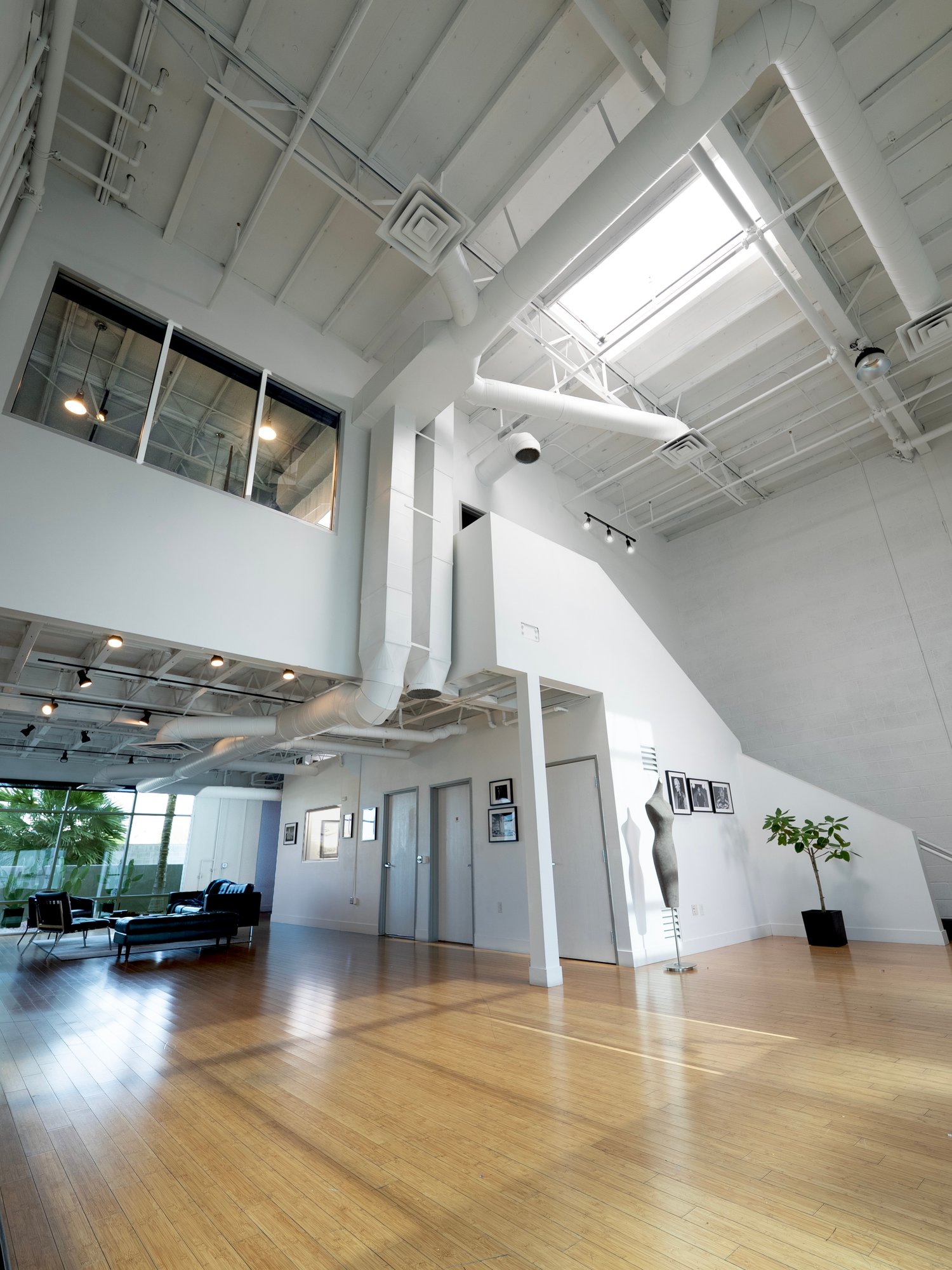 The Uptown Loft &mdash; wide view of the natural-light studio with 20 ft ceilings, Las Vegas.