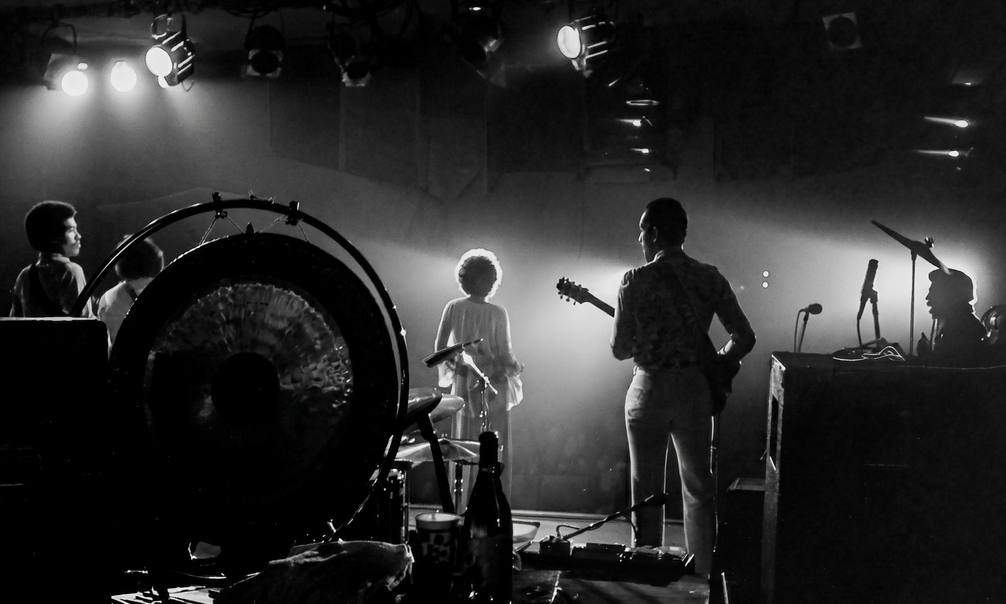 Concert scene from behind &mdash; band on stage with Marlena Shaw silhouetted in spotlights, B&W, Las Vegas.